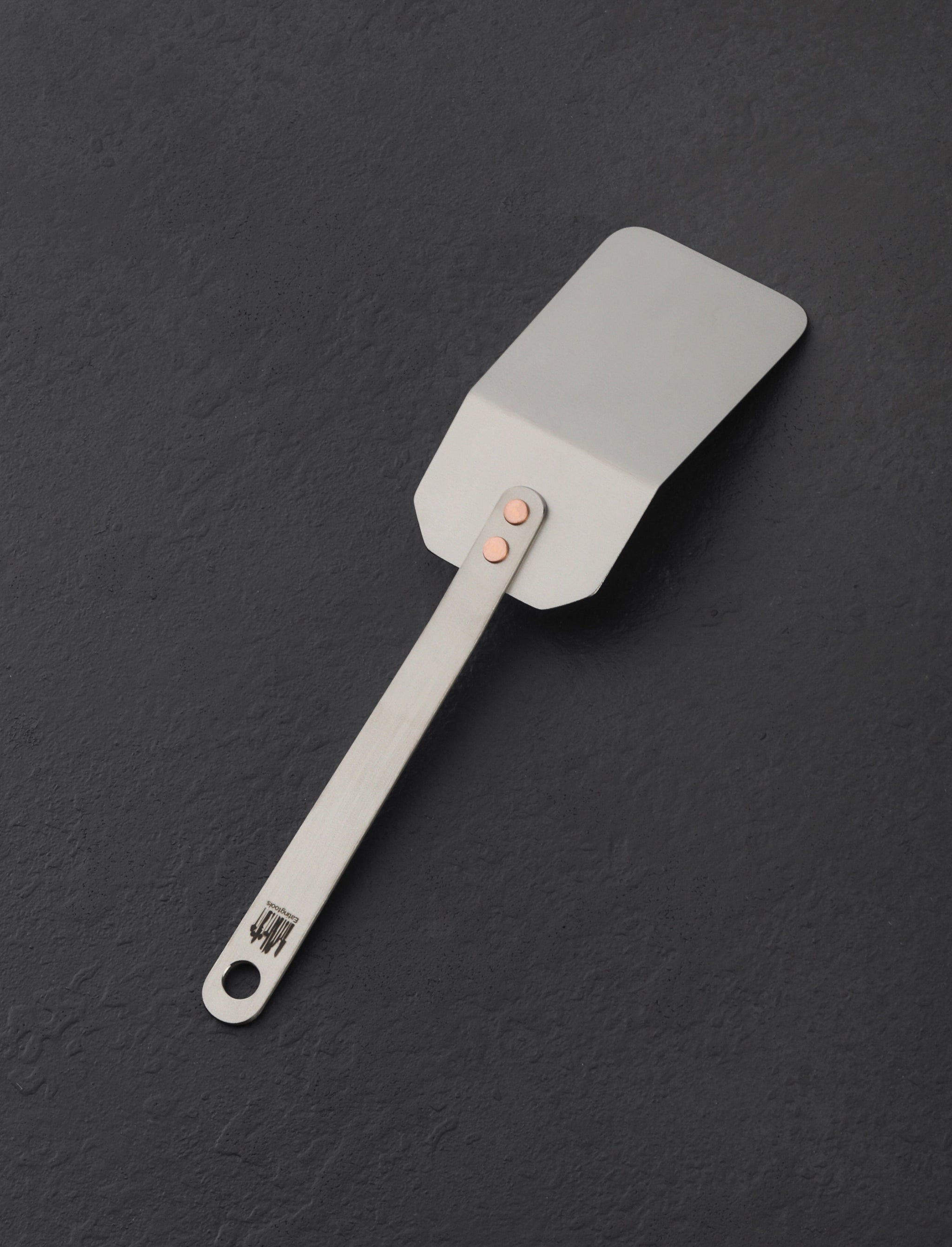 https://eatingtools.com/cdn/shop/files/spatulas-ben-tendick-oregon-tispats-mini-titanium-spatula-43020338790675.jpg?v=1693333804&width=2048